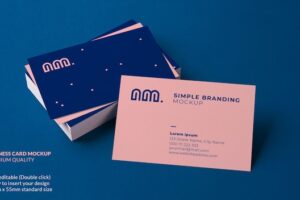 Business card mockup resting on a stack of cards