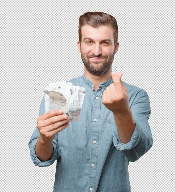 Handsome young man with money in hand