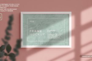 Horizontal photo frame mockup hanged in the wall in 3d rendering