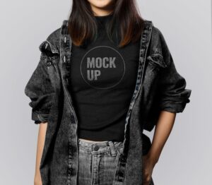 Woman wearing black t-shirt and denim jacket