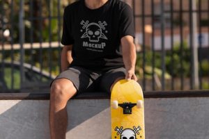 Young man with mock-up skateboard