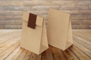 3d illustration paper delivery bag isolated on wooden background
