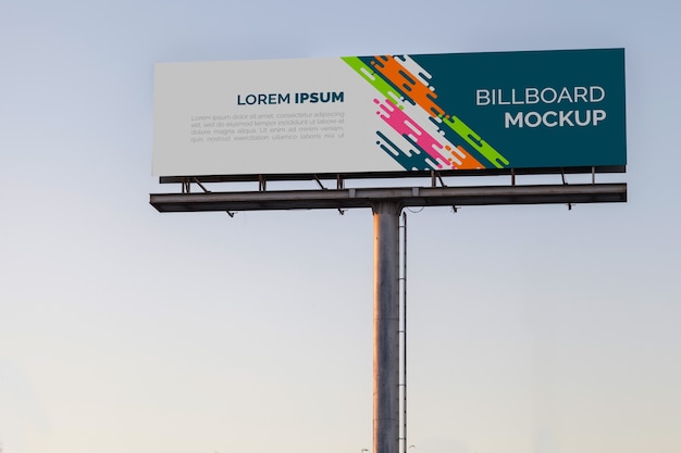 Billboard mockup on sunset sky