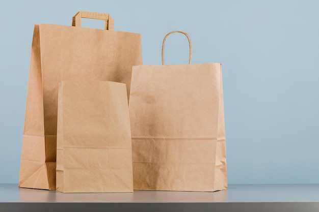Brown paper bag with handles empty shopping bag with area for your logo or design food delivery concept