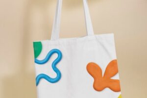 Canvas tote bag mockup psd with abstract plasticine clay pattern