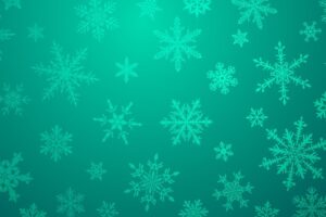 Christmas background with various complex big and small snowflakes in light blue colors