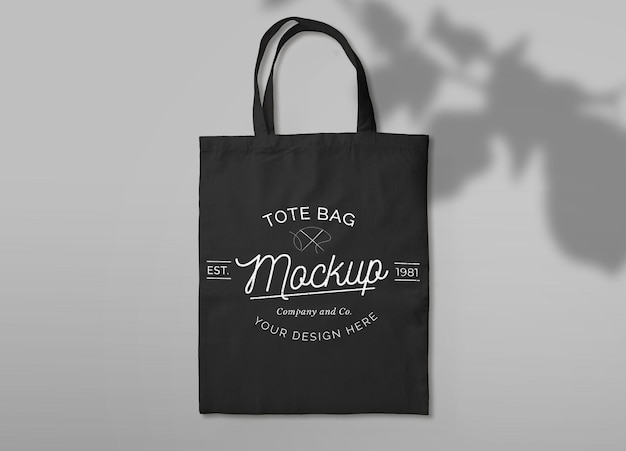Isolated black tote bag with plant shadow