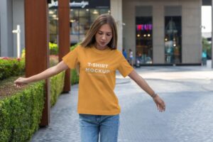 T-shirt mockup girl walking in modern city