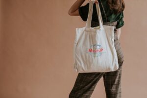 Woman with a tote bag mockup
