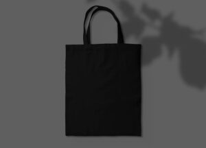 Black tote bag with plant shadow