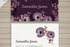Blue business card with floral elements