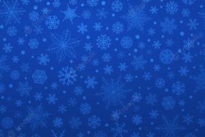 Christmas background of various complex big and small snowflakes in blue colors