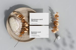 Clean minimal business card with floral mockup