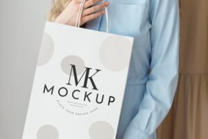 Close-up woman with shopping bag mockup