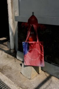 Colorful tote bag mock-up outdoors on golden hour