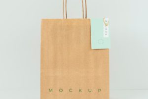 Front view of paper shopping bag mock-up with paper tag