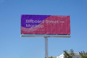 Large billboard mockup on clean blue sky