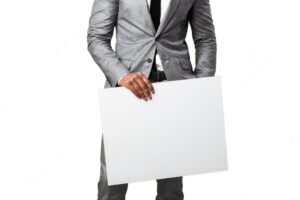 Man in suit with a white poster