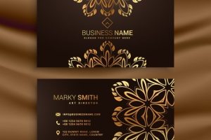 Premium luxury business card design with golden floral decoration