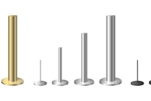 Realistic set of metal golden silver and black poles of different size isolated vector illustration