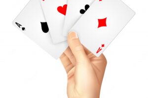 Regular playing cards spread holding hand