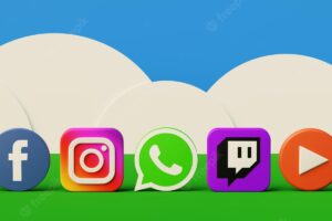 Social media logos on a green meadow with clouds on the horizon and a blue sky