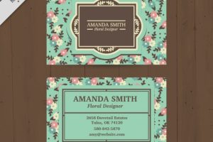 Turquoise business card with flowers