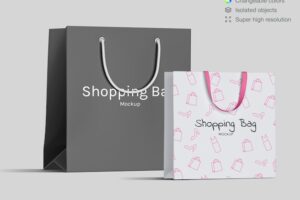 Two realistic front view shopping paper bags mockup template