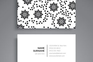 White business card with hand drawn dots and flowers