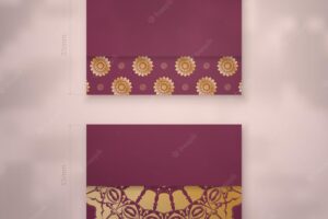 Burgundy business card with luxurious gold ornaments for your brand