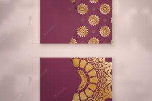 Burgundy business card with vintage gold ornaments for your brand