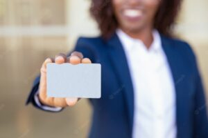 Businesswoman showing credit card