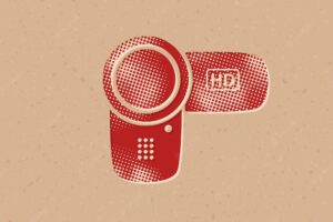 Camcorder halftone style icon with grunge background vector illustration