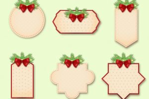 Christmas sale labels set decorated with a bow and fir branches.