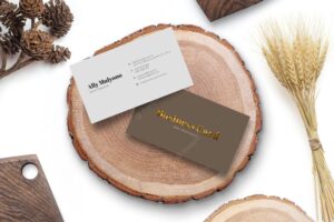 Clean minimal business card on wood cut natural and wheat background logo mockup premium psd