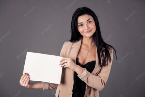 Girl presenting blank paper