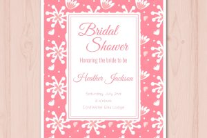 Pink bridal shower invitation with white flowers