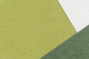 Texture of craft green color paper background with olive and white border vintage abstract khaki cardboard