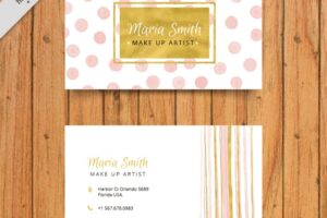 Business card with decorative dots and lines