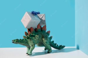 Dinosaur toy wearing presents