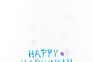 Bright happy hanukkah writing