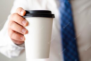 Close-up man holding coffee cup mock-up