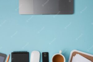 Flat lay laptop touchpad with mouse and coffee