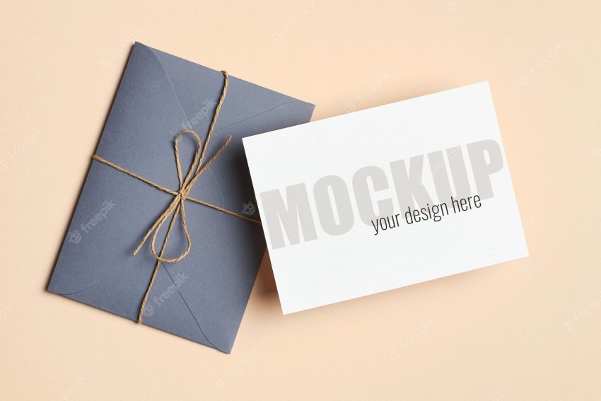 Greeting card or invitation stationary mockup with envelope on paper background