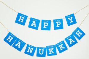 Happy hanukkah garland on wall