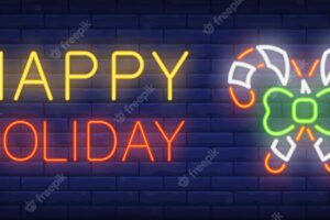 Happy holiday neon text and two candy canes