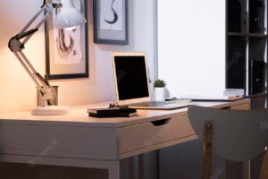 Nice and organised workspace with lamp