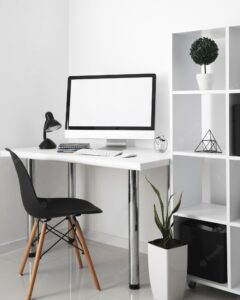 Office desk with computer and desk chair