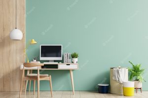 Office room with a pastel wall.