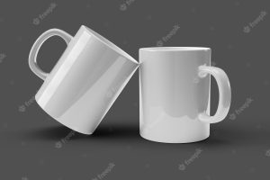 Pack of two white mugs over black surface